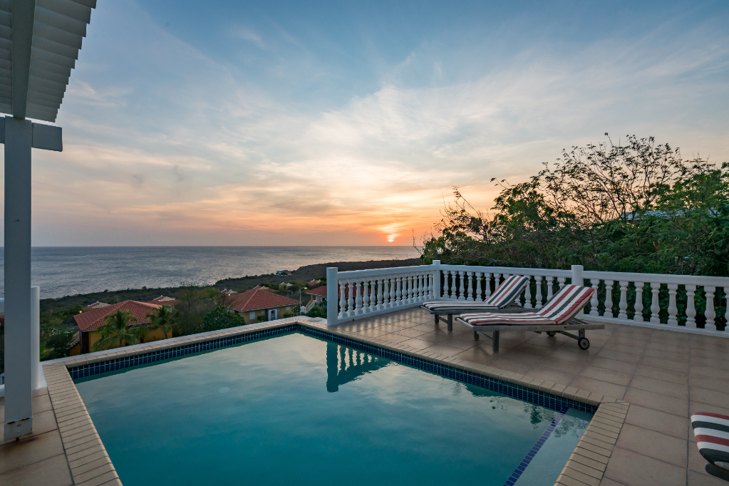Sunset drinks by the swimming pool - Curacao coastline